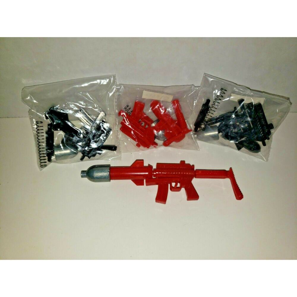 Vintage‎ 4 Spring Loaded Submachine Guns Shooting Vending Toys NOS SKU13